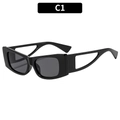 Lunettes de soleil œil de chat noires avec branches géométriques ajourées - Monture Noire Verres Gris