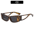 Lunettes de soleil œil de chat à monture écaille et branches triangulaires évidées - Écaille Mixte Lentille Grise