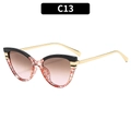 Cat-eye sunglasses with black gold frames and red geometric pattern gradient lenses - Black Red Striped Frame Grey Pink Lens