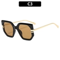 Lunettes de soleil oversize géométriques noires avec verres bruns et branches dorées - Monture Noire Verres Thé