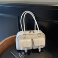 Glossy cream white bowling tote bag with double front pockets and twin top handles - Off White