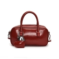 Chic dark red glossy leather bowling handbag with heart charm and crossbody strap - With Heart Pendant / Red