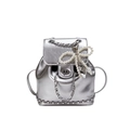 Silver metallic backpack for women with pearl bow charm and elegant chain detailing - With Ornament / Silver