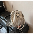Close-up of pleated bucket bag with metallic chain strap and drawcord closure - Gray