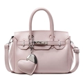 Elegant light pink Kelly style handbag featuring a heart charm and adjustable strap - With Pendant / Pink