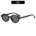 Occhiali da sole ovali neri vintage con rivetti argentati e lenti grigio scuro chic - Montatura Nera Lenti Grigie