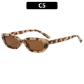 Retro cat-eye sunglasses featuring a tortoiseshell frame and dark brown lenses - White Speckled Tea Lens
