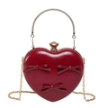 Borsa da sera rossa a forma di cuore con fiocchi e manico circolare in metallo dorato - Rosso