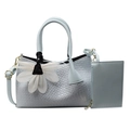 Light blue woven pattern handbag with white flower charm and matching coin pouch - Blue