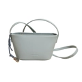 Light blue faux leather bucket bag with CLEAROK logo and heart charm on white background - Light Blue
