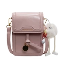 Pink crossbody phone bag in glossy synthetic leather with cute plush doll charm - With Pendant / Pink