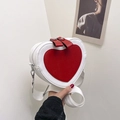 Crossbody heart-shaped bag in red and white color block with adjustable wide strap - White