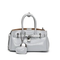 Light blue faux leather bucket bag with silver lock and heart charm accessory - Light Blue