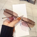Fashionable rimless polygon sunglasses with pink gradient lenses and textured metal temples - Tea Pink Gradient