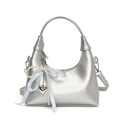 Silver semi-moon handbag with metallic finish, pearl charm, and blue bow detail - Silver