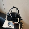 Glossy black patent leather bow bowling bag with lace trim and ribbon handle - Black
