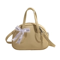 Minimalist cream yellow bowling bag with lychee texture and a white decorative bow ribbon - Yellow