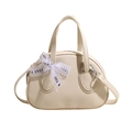 Elegant cream-white bowling bag with lychee texture and a decorative bow ribbon charm - Off White