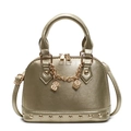 Elegant gold shell handbag with pebbled texture and metallic dice charms detail - Gold