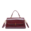 Retro burgundy patent leather crossbody bag with top handle and metallic buckle lock - Red