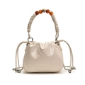 Chic beige quilted drawstring bucket bag with unique beaded handle and chain strap - Cream