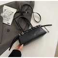 Black leather Boston bag with silver buckle straps and adjustable shoulder handles - Black (Without Charm)