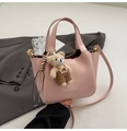 Pink faux leather bucket bag with cute bear charm and adjustable shoulder strap - Pink With Charm