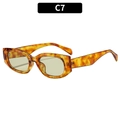 Retro tortoiseshell oval sunglasses with translucent amber pattern and light green lenses - Amber Frame Green Lens