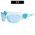 Oval light blue sunglasses with a transparent frame and heart detail on the temple - Blue Frame Blue Lens (C7)
