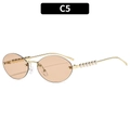 Lunettes de soleil ovales sans monture marron avec branches dorées et perles blanches - Monture Dorée Verres Champagne