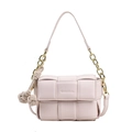 Light pink woven leather crossbody bag with elegant gold chain and knotted charm - White With Pendant