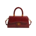 Vintage dark red top handle square bag with glossy finish and bronze twist lock - Red