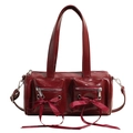 Ballet style burgundy patent leather barrel bag with bow accents and zip pockets - Burgundy