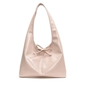 Detailed view of pale pink hobo bag featuring glossy patent leather and a bow drawstring - Sakura Pink