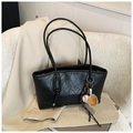 Black PU leather shoulder bag for women, trendy commuter tote with cute baseball glove keychain. - Black With Pendant