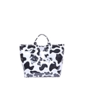 Glossy PVC tote bag with cow print pattern and TOTE BAG text in minimalist style - Cow Print