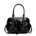 Borsa vintage in pelle verniciata nera con fiocchi e cuciture a contrasto - Nero