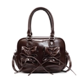 Borsa in pelle marrone scuro con accenti a fiocco e dettagli di cuciture a contrasto - Marrone