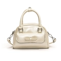 Pearlescent cream bow handbag with shell shape and detachable silver chain strap - Off-white