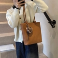 Brown woven leather tote bag with leopard print heart charm and dual thin straps - Brown with Pendant