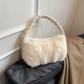 Cream white faux fur handbag with braided handle and plush texture for winter fashion - Off White