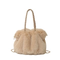 Detail of plush faux fur tote with braided handle and golden metal chain shoulder strap - Khaki