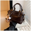 Deep brown glossy leather Boston bag with baseball charms and gold hardware accents - With Charm Style / Coffee with Pendant