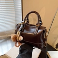 Retro dark brown boston handbag with glossy leather finish and cute charm pendants - With Charm / Brown