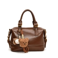 Brown vintage Boston handbag with glossy leather finish and cute bear baseball charm - With Pendant / Brown
