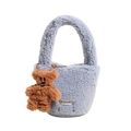 Light blue faux shearling plush tote bag with a brown teddy bear charm accessory - Blue