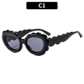 Modische schwarze Sonnenbrille mit Wellenrand und ovalem Rahmen für Damen - Schwarz