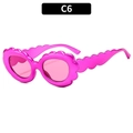 Modische rosarote Sonnenbrille in Blumenform mit gewelltem Rahmen für Damen - Rosarot