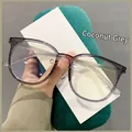 Gafas redondas minimalistas de TR90 gris transparente con lentes de luz azul - Gris Coco
