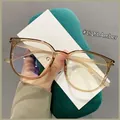 Montura de gafas TR90 de gran tamaño color té claro con lentes de filtro de luz azul - Color Té Claro